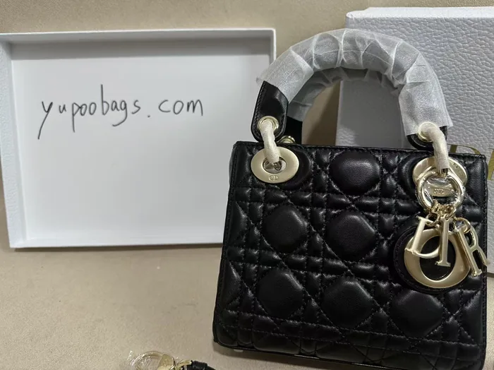 Dior Lady rep bag QC shot with yupoobags.com handwritten proof note — Cannage lambskin, gold-tone D.I.O.R. charms